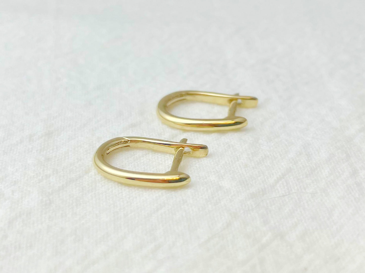 14K Yellow Gold Oval Huggie Earrings