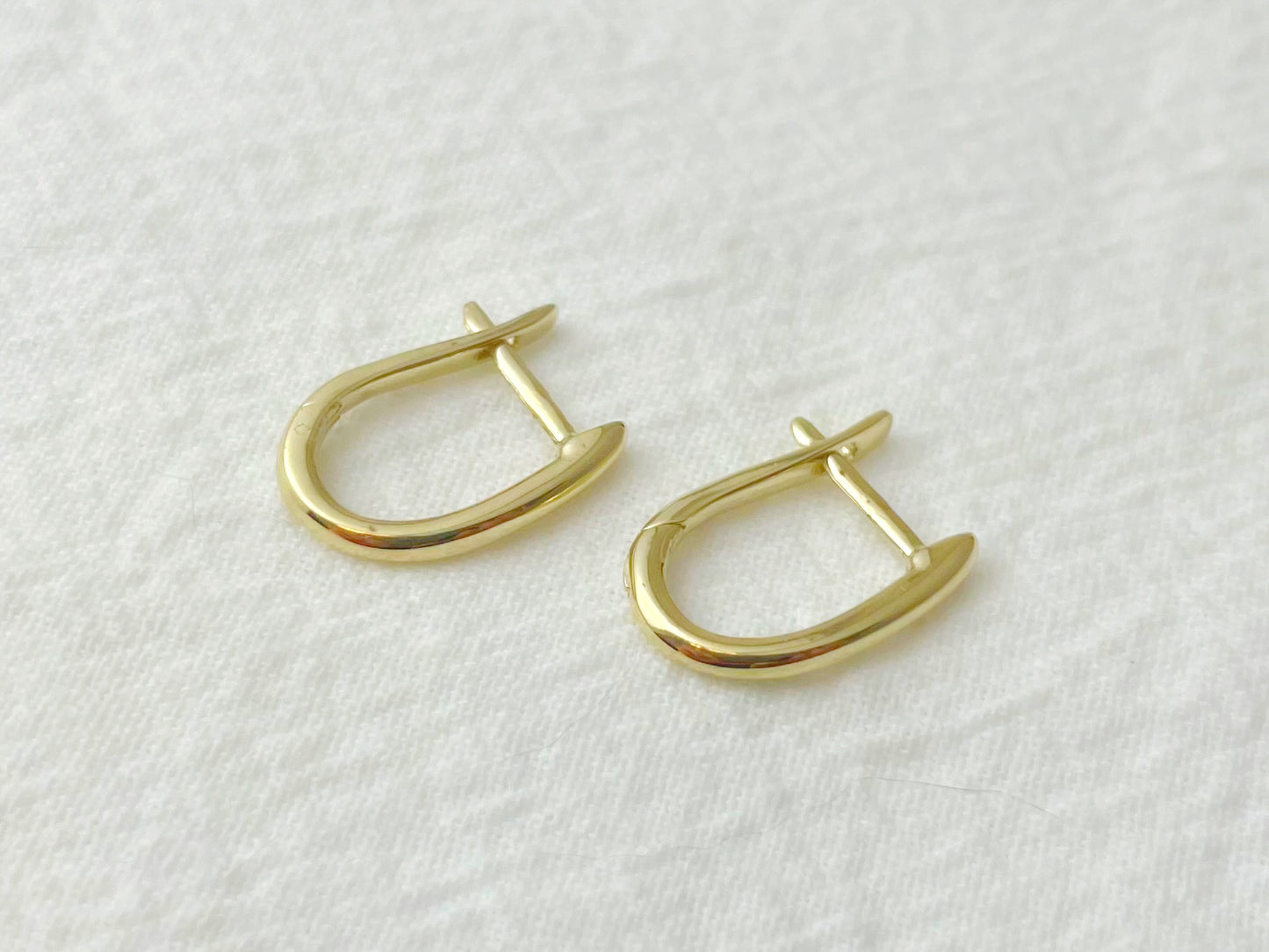 14K Yellow Gold Oval Huggie Earrings