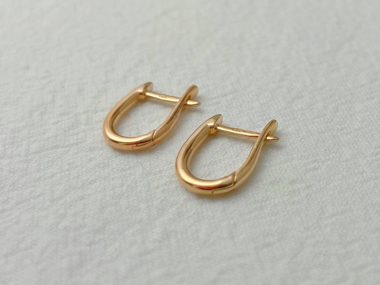 14K Rose Gold Oval Huggie Earrings