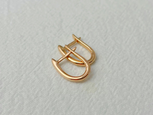 14K Rose Gold Oval Huggie Earrings