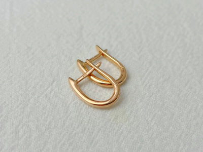 14K Rose Gold Oval Huggie Earrings