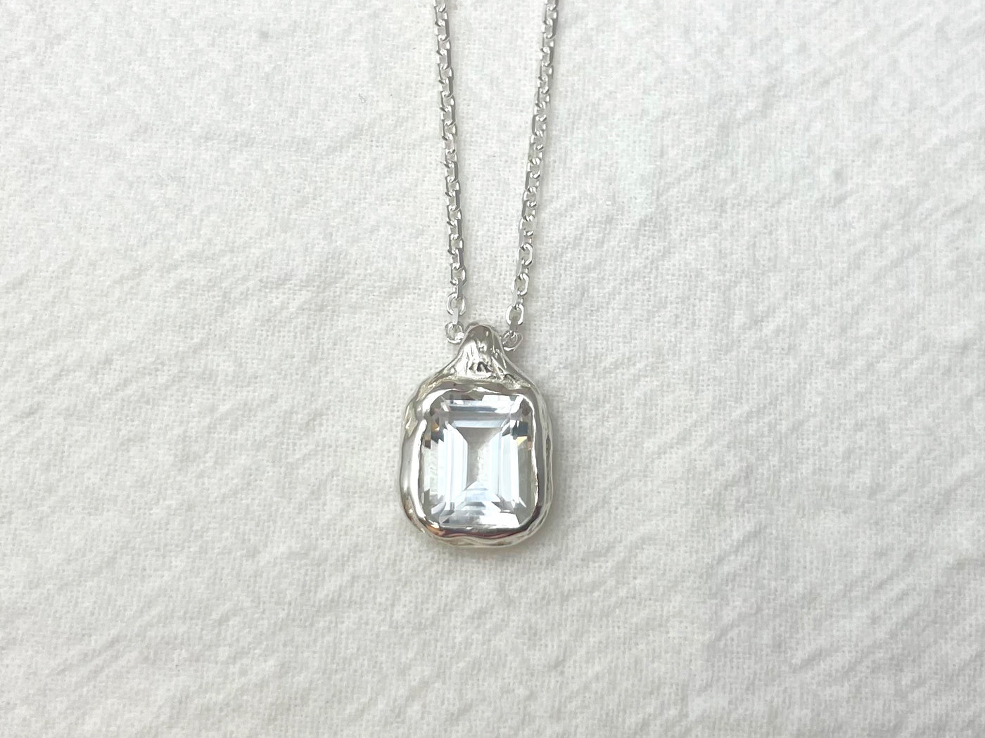 Crystal Tide – Silver White Topaz Pendant